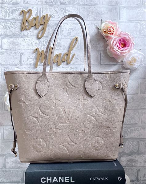 neverfull monogram empreinte leather.